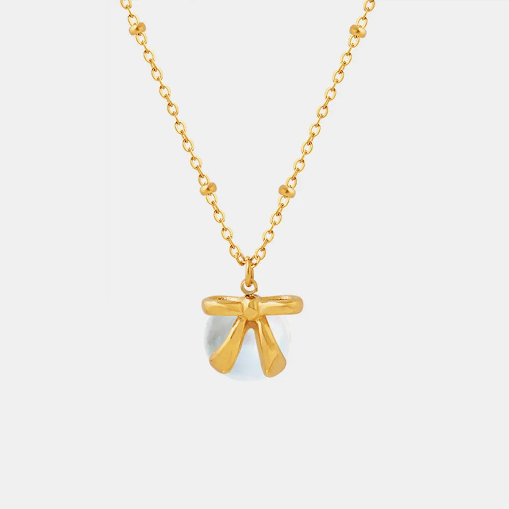 Collar de colgante de bow y cuentas de acero de titanio