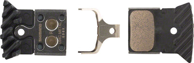 Pastillas de freno de disco metálicas Shimano L04C-MF con placa trasera de aleación con aletas
