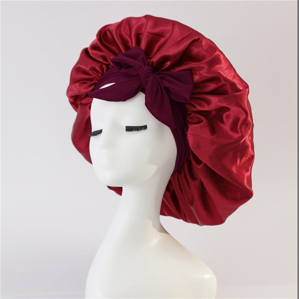 Turban élégant à large bord avec détail en nœud