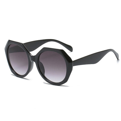 Gafas de sol de marco irregular a la moda para mujeres