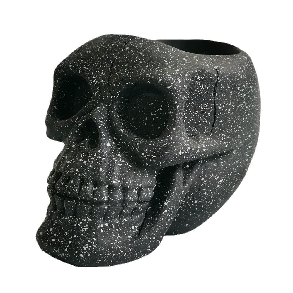 Soporte para bolígrafos con diseño de calavera negra