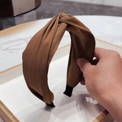 Fashionable fabric cross bow headband - Korvel