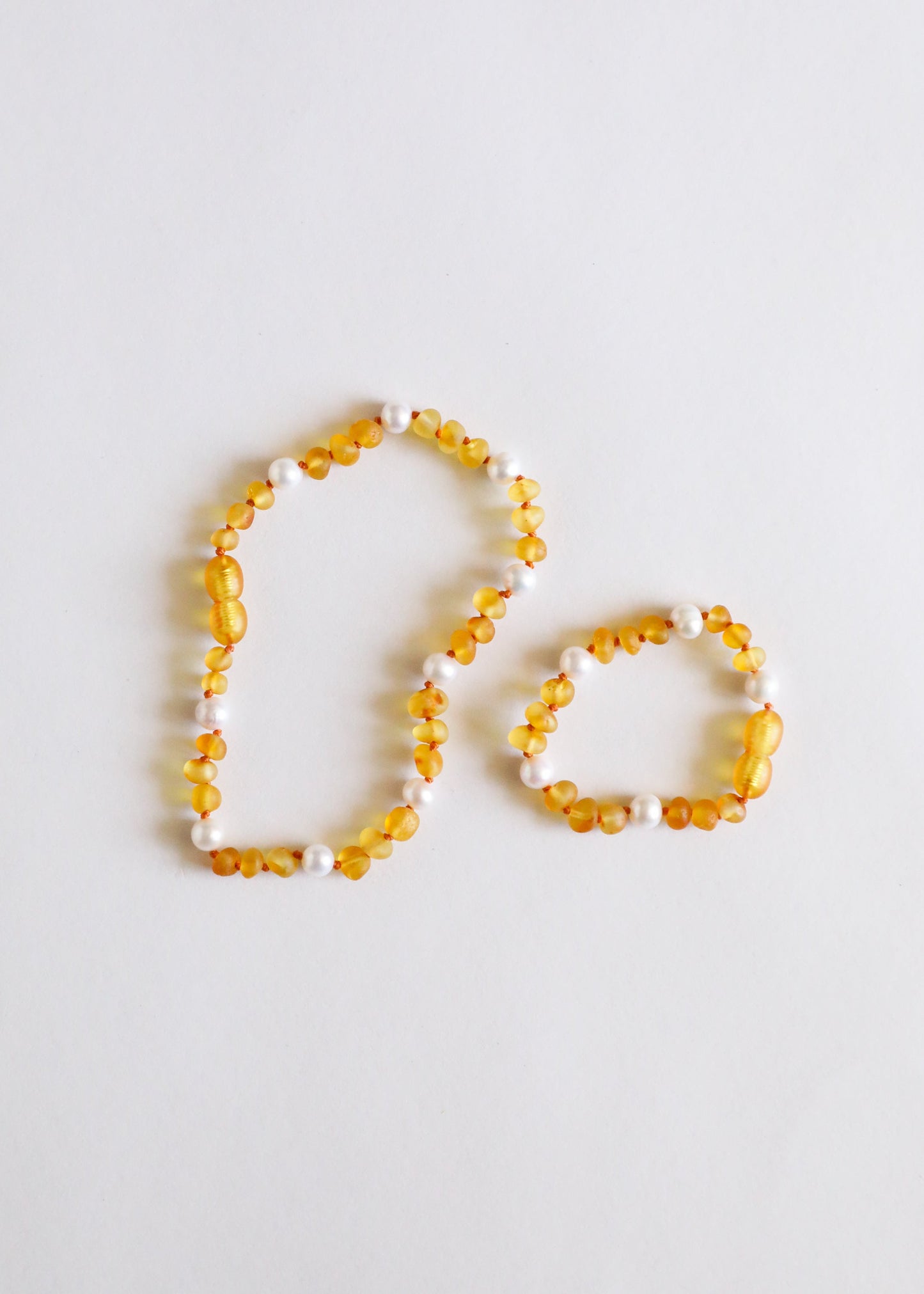 Bracelet ou anklet en ambre baltique miel brut et perles halo