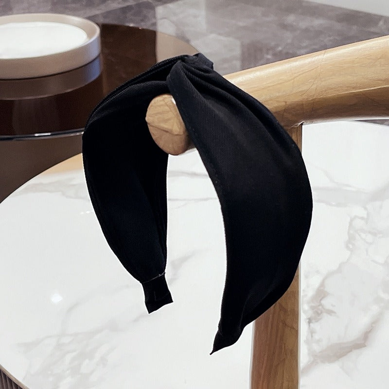Fashionable fabric cross bow headband - Korvel