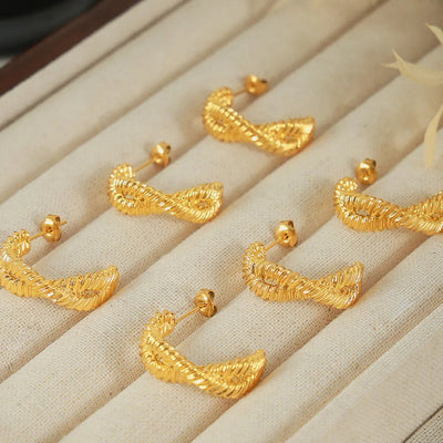 Boucles d'oreilles géométriques en acier titane