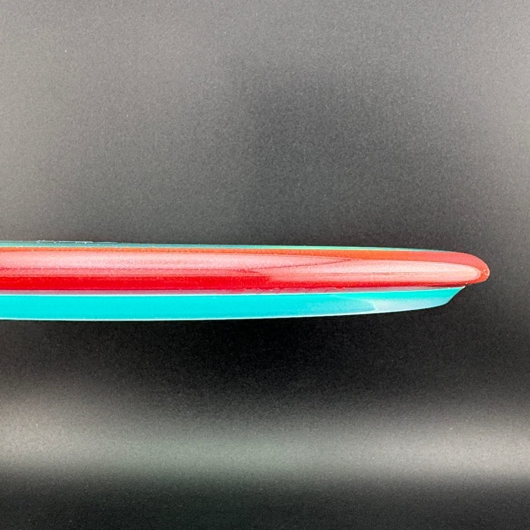 Disque de golf Axiom Prism Proton Pyro