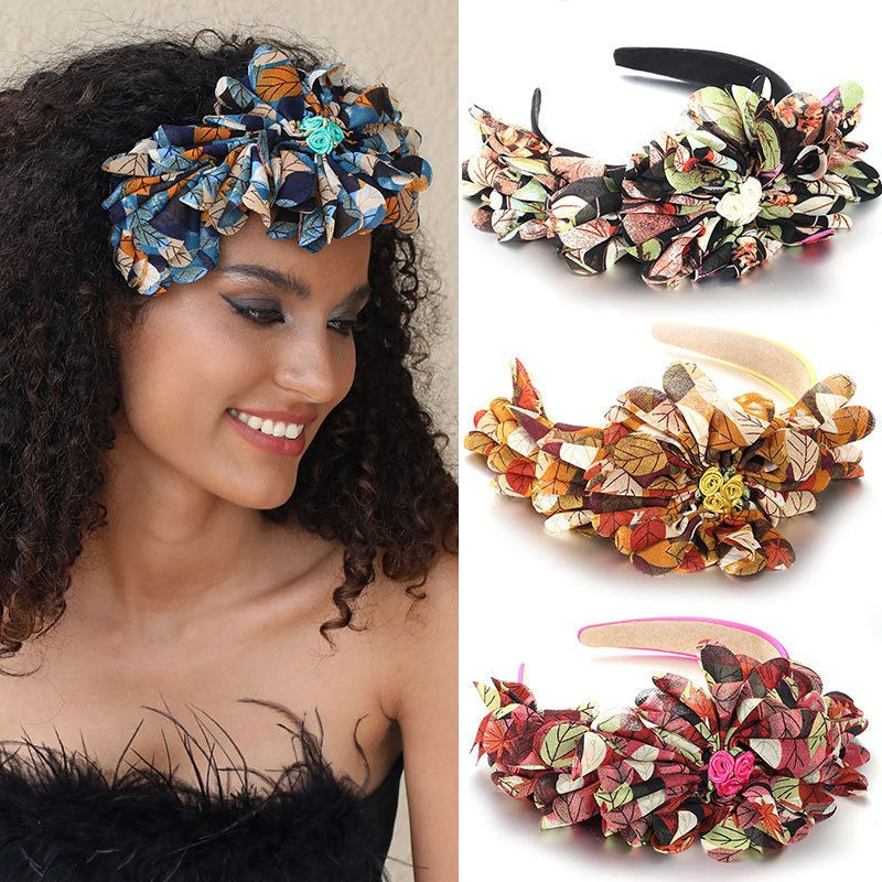 Bandeau à motif floral et feuillage surdimensionné
