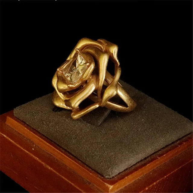 Boucles d'oreilles élégantes en laiton doré en forme de rose pour femmes
