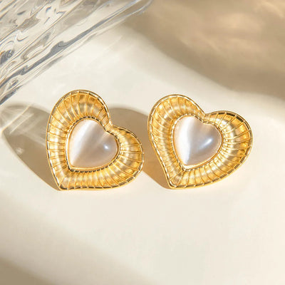 White cat eye stone earrings with niche temperament titanium steel earrings - Korvel
