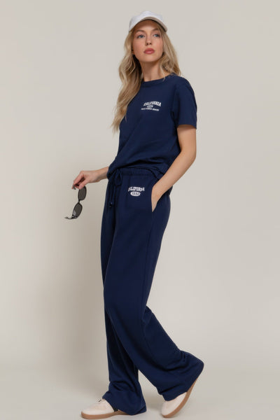 Pantalons de survêtement avec détail imprimé à la taille