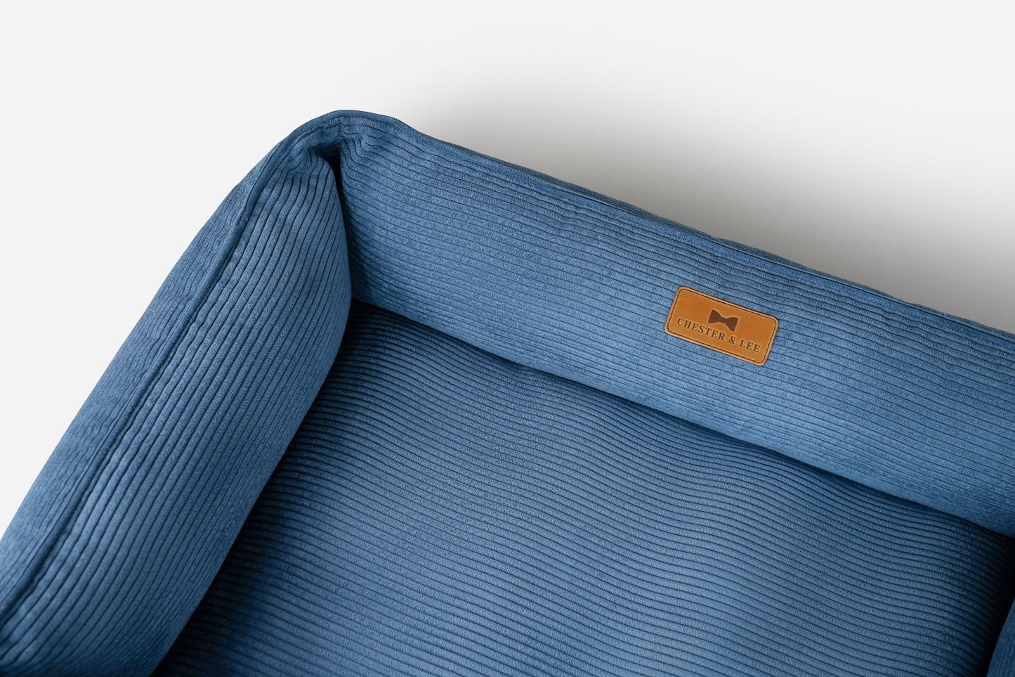 Cama para perros de terciopelo azul lujosa