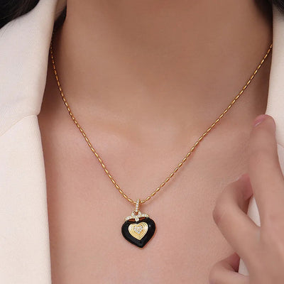 Collier en forme de cœur en acier titane