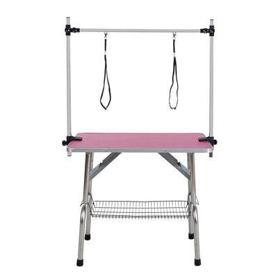 36 inch folding pet grooming table with stainless steel frame and rubber pad, equipped with adjustable armrests and clips (pink) - Korvel