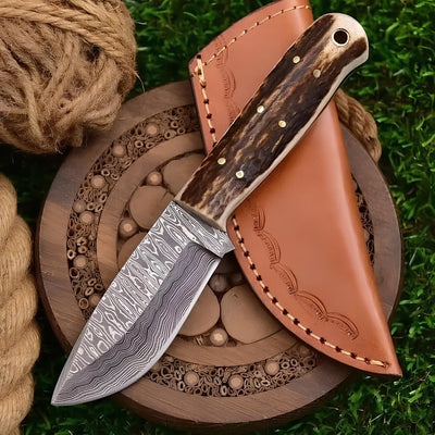 Exquisite Damascus Steel Hunting Knife with Deer Antler Grip and Leather Sheath - Korvel