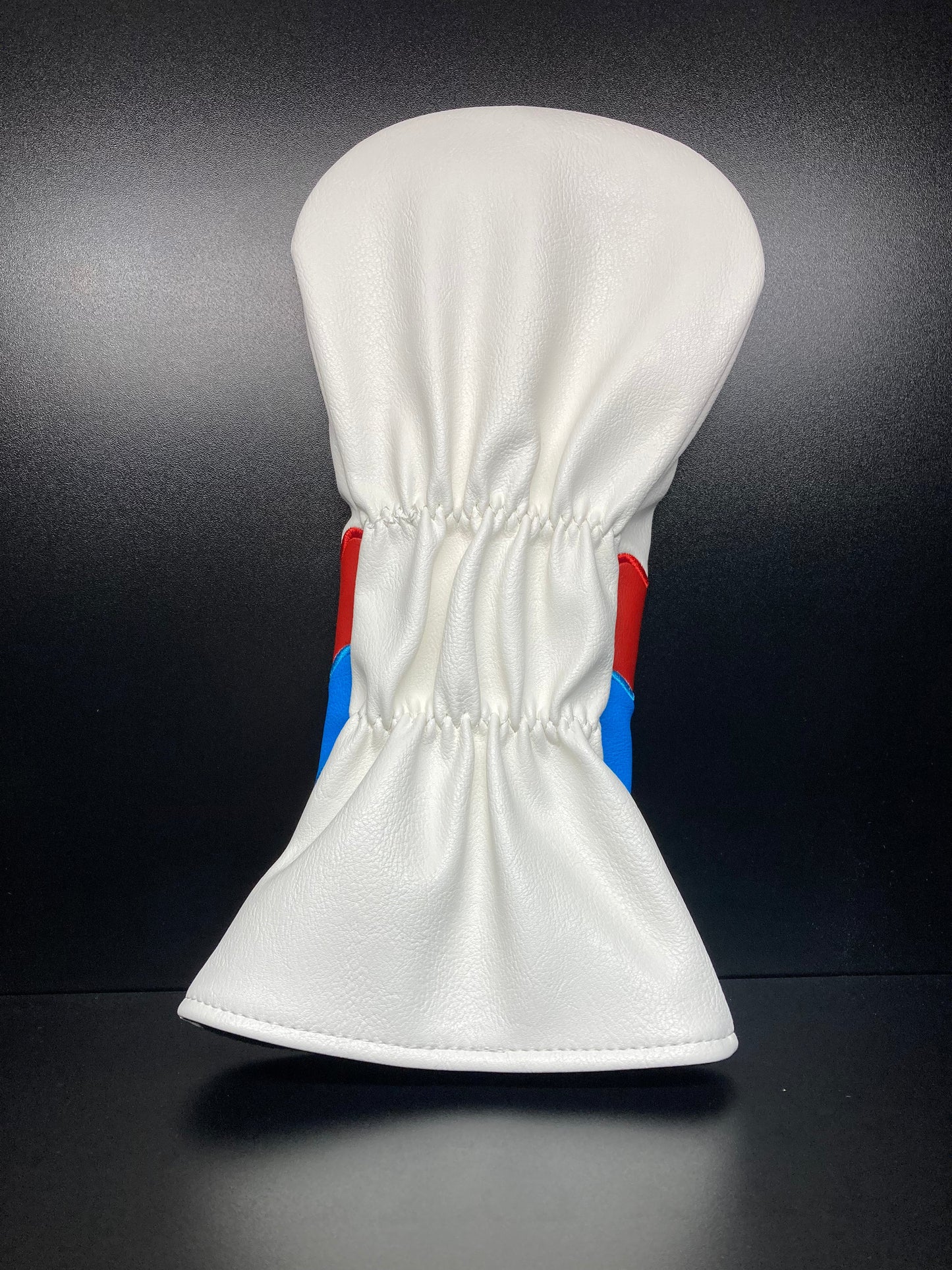 Funda para palo de golf con forma de petardo y paleta