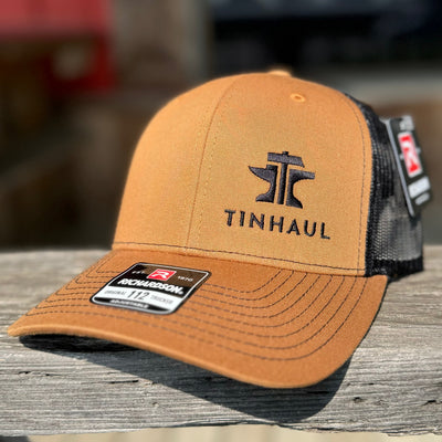Stylish Tan Trucker Cap with Bold Logo | Tin Haul - Korvel