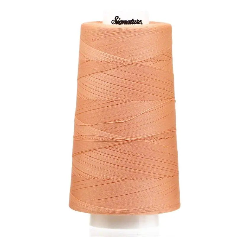 Fil en coton signature pêche pâle