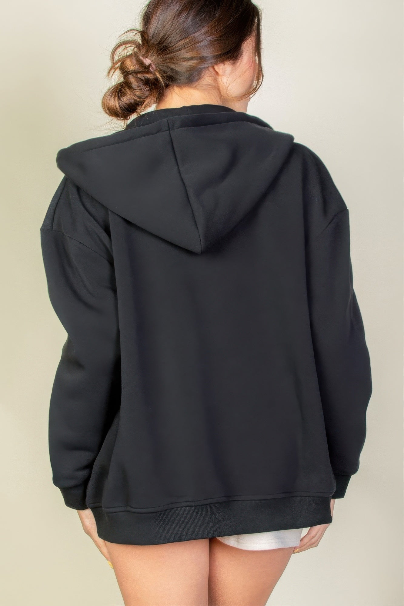 Sudadera con cremallera y hombros caídos gráficos