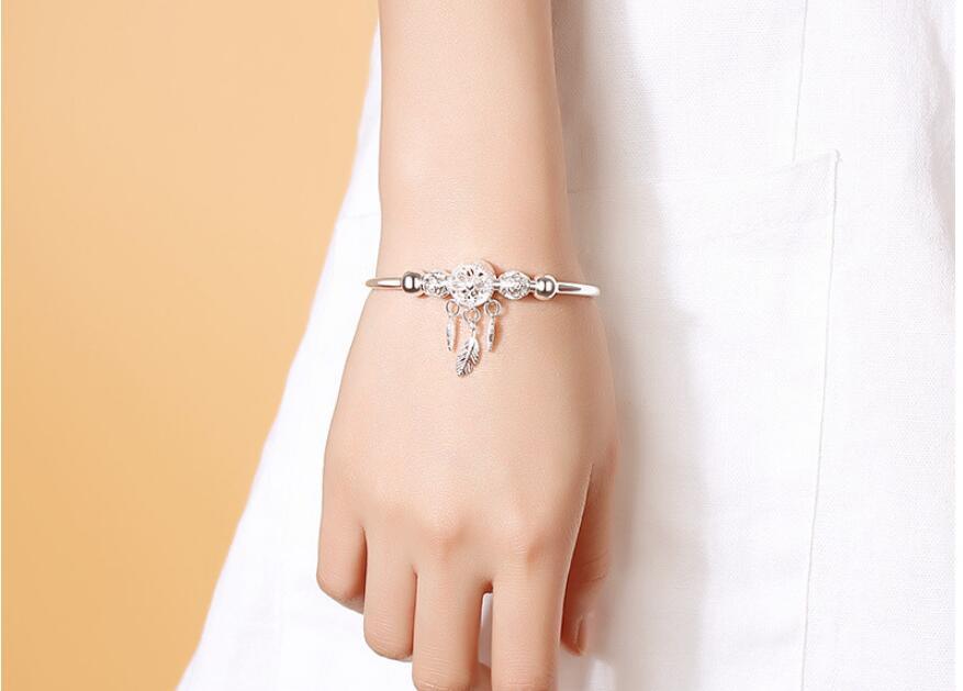 Bracelet en argent sterling réglable avec charme attrape-rêves et plume