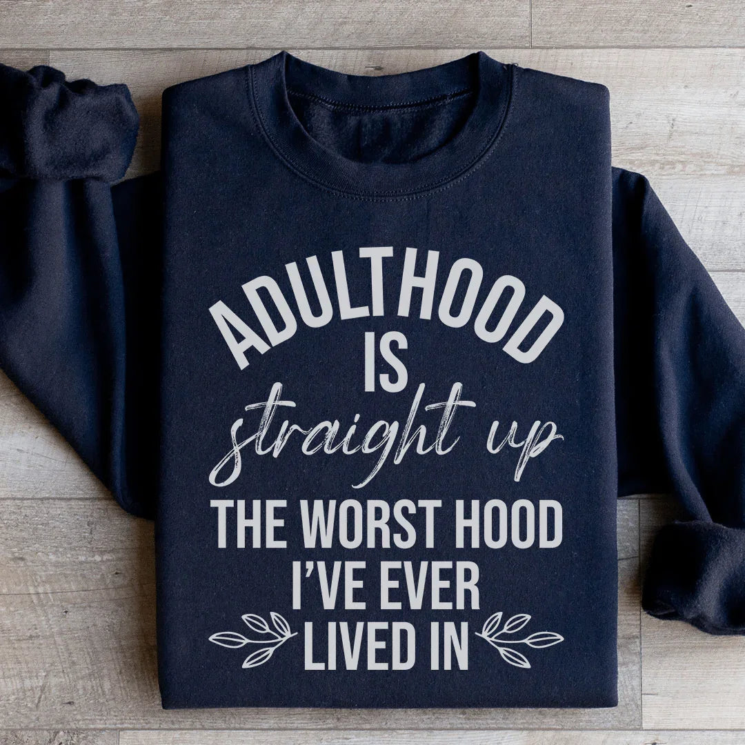 Sudadera "La edad adulta es el peor barrio en el que he vivido"
