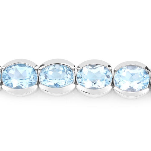 Bracelet en argent sterling .925 avec topaze bleue véritable de 44,00 carats