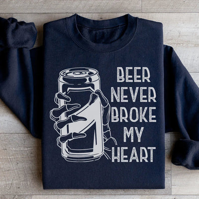 Sudadera con capucha y calavera "La cerveza nunca me rompió el corazón"