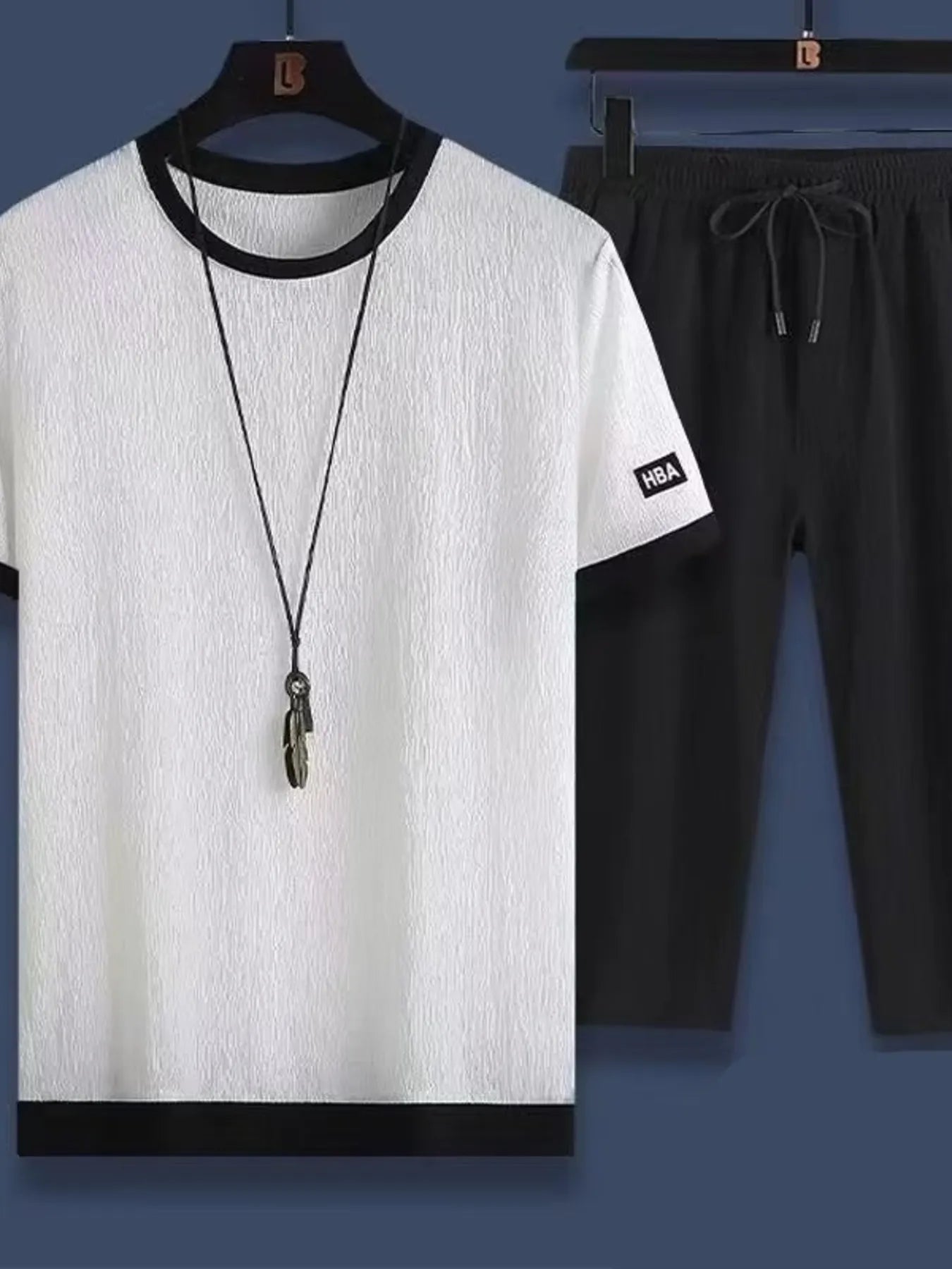 Conjunto de camiseta de cuello redondo de manga corta y pantalones cortos para hombres en tallas gra