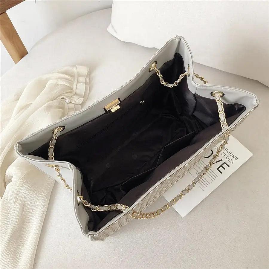 Sac à bandoulière en cuir PU élégant avec chaîne pour femmes