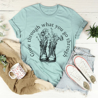 Camiseta Grow Through What You Go Through Boots