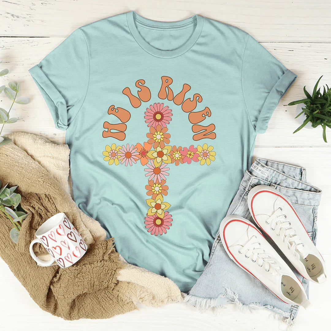 Camiseta cruzada floral "Él ha resucitado"