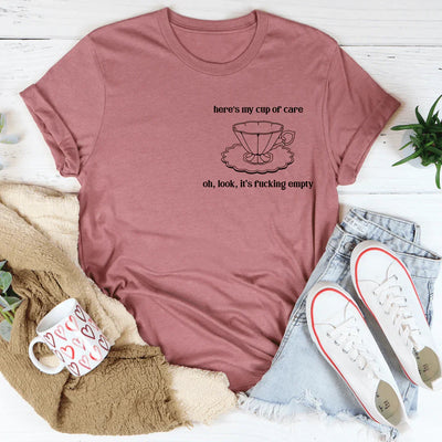 Aquí está mi camiseta "Taza de Cuidado"