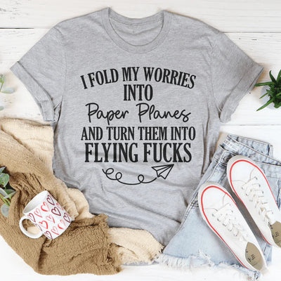 Camiseta Doblo Mis Preocupaciones en Aviones de Papel