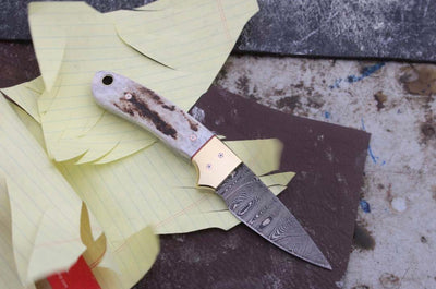 Artisan Crafted California Coyote Cowboy Knife | Unique Damascus Blade | Antler Horn & Brass Handle | 6.25 Inches | Premium Leather Sheath - Korvel