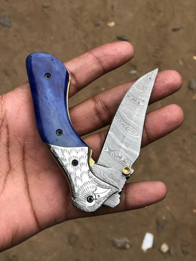 Artisan Crafted Damascus Steel Folding Pocket Knife with Vibrant Bone Handle & Leather Sheath - Korvel