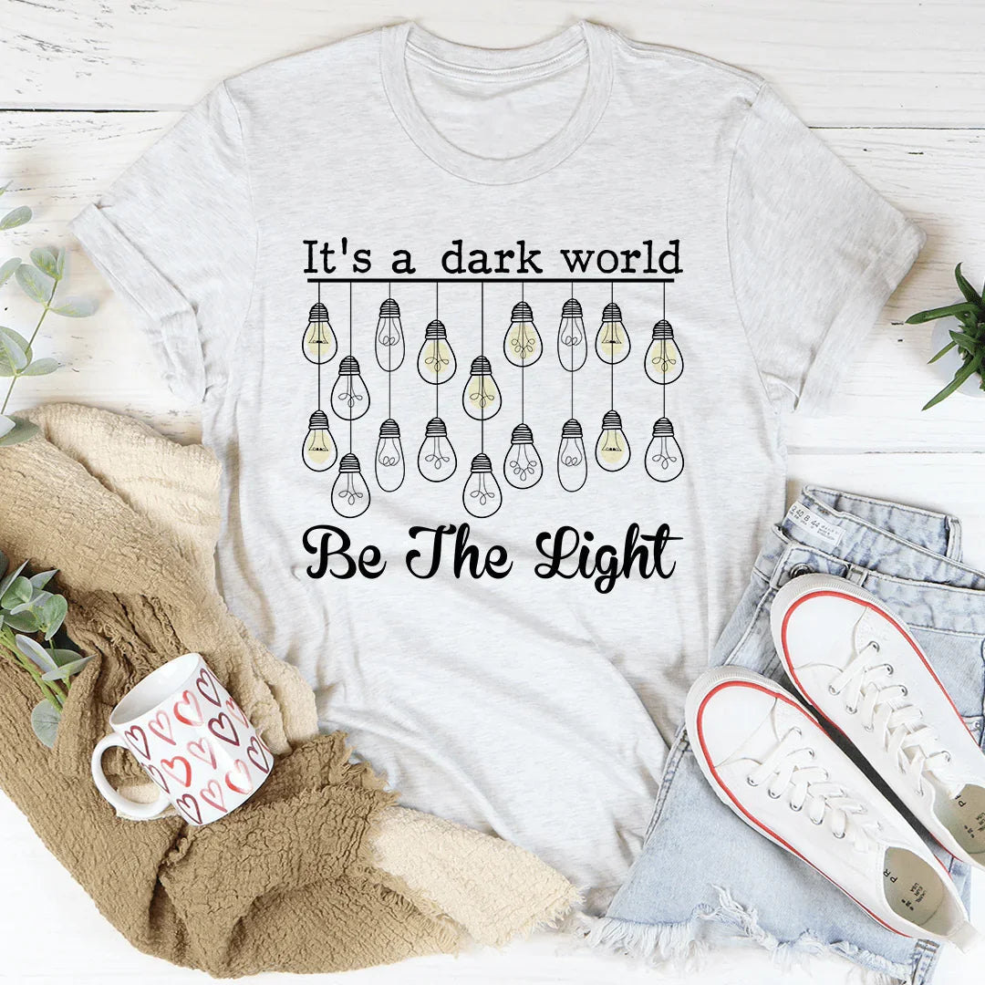 It's A Dark World Be The Light Tee - Korvel