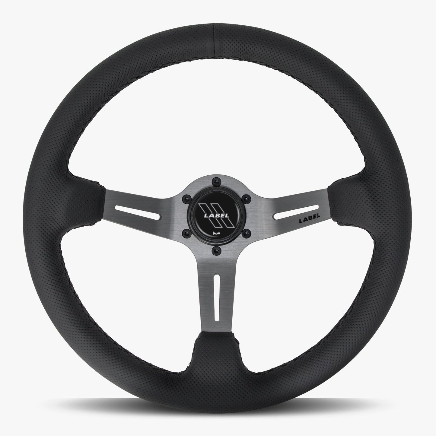 Le volant Le Mans | Cuir perforé noir et moyeu en graphite