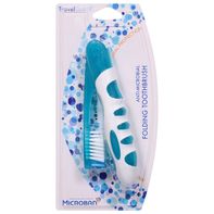 Cepillo de dientes plegable Sprayco con protección antimicrobiana