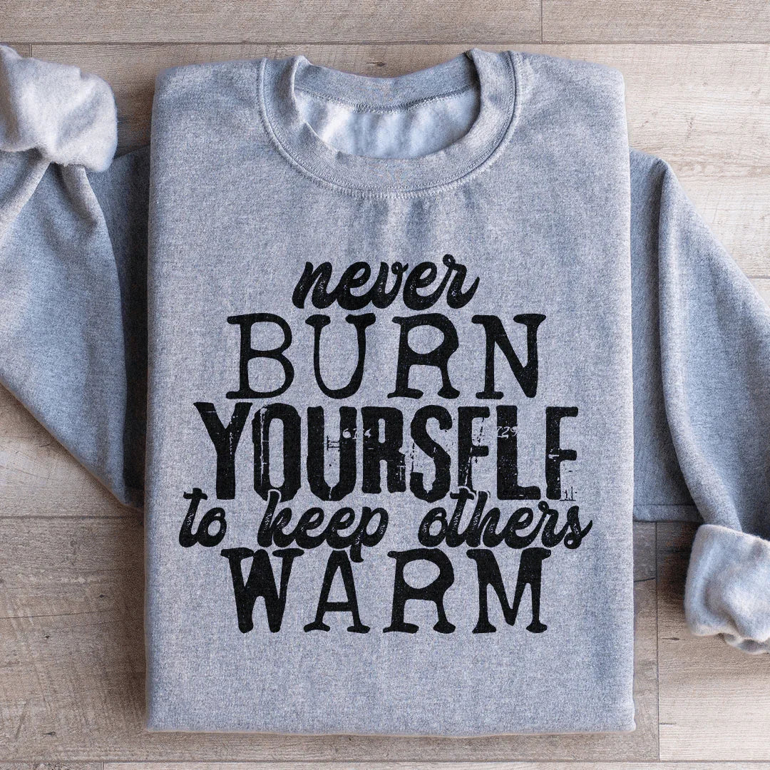 Sudadera "Nunca te quemes para mantener calientes a los demás"