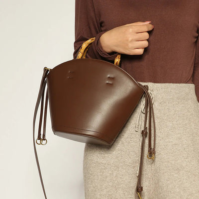 Elegant Bamboo Handle Bucket Bag in Soft Leather