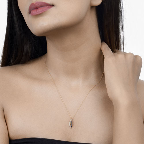 Pendentif en or jaune 14K avec saphir bleu et diamant de 0,40 carat