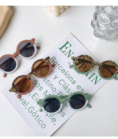 Lunettes de soleil élégantes en forme ronde pour tous les âges