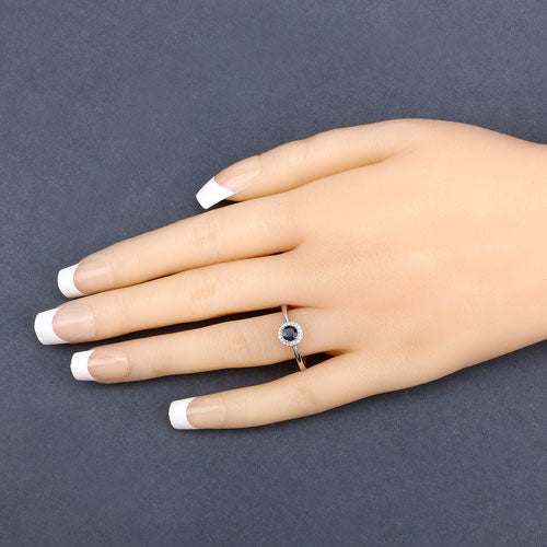 Bague de fiançailles en saphir bleu et diamant de 0,52 carat en or blanc 14 carats