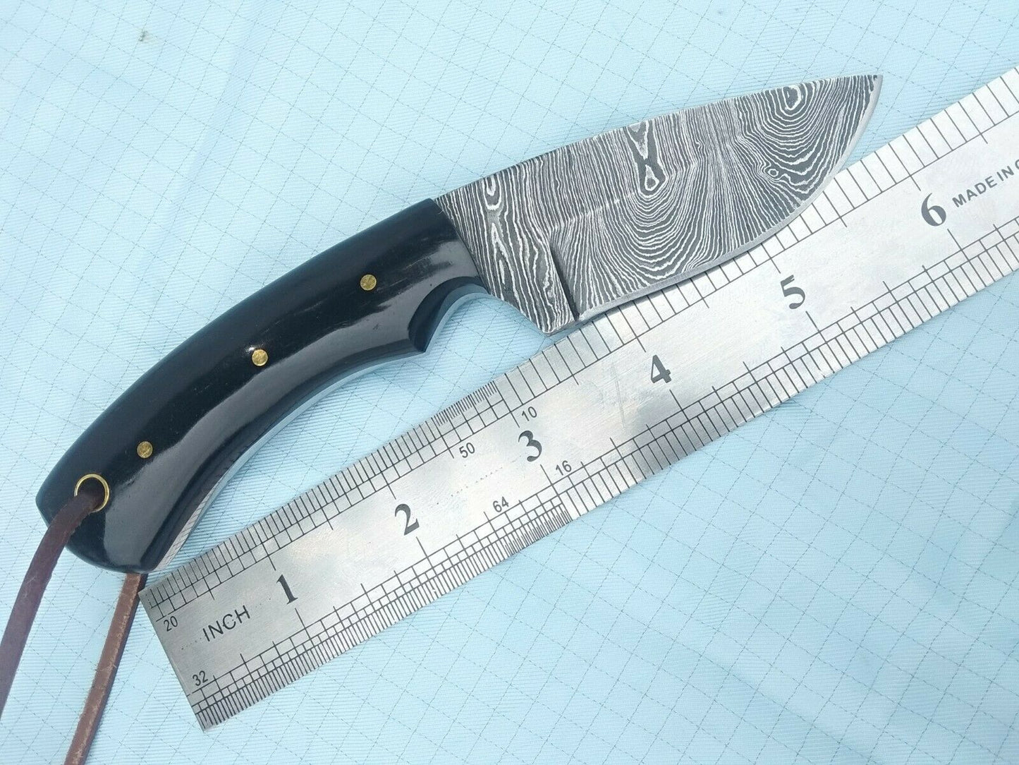 Artisan Crafted Damascus Steel Skinning Knife with Buffalo Horn Handle - Korvel