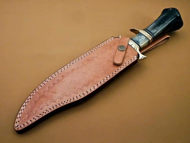 Rugged Bowie Knife: Exquisite Twist Damascus Steel Blade with Bone Handle & Leather Sheath - Korvel