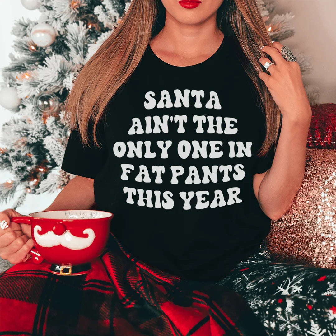 Le t-shirt Santa n'est pas le seul à porter des pantalons larges cette année