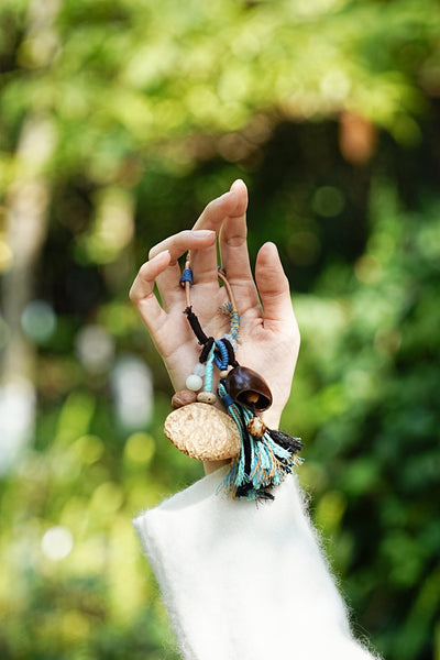 The Azure Spirit - Natural Nut Bag Charm with Boho Blue Tassel