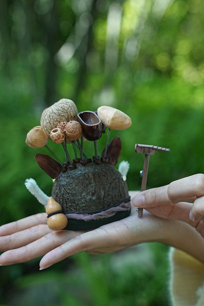 The Wild Guardian - Nut Shell Boar Doll with Rake & White Tusks