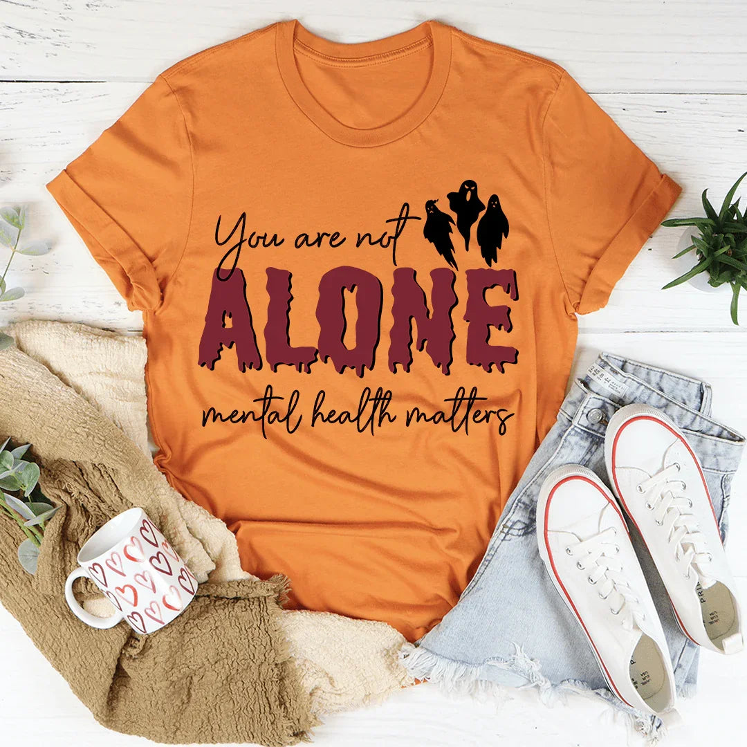 Camiseta de Halloween para concienciar sobre la salud mental "No estás solo"