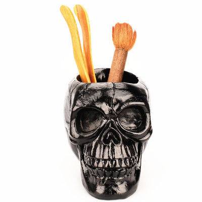 Soporte para bolígrafos con diseño de calavera negra