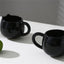 Adorable hand - painted cat - shaped ceramic mug, perfect for coffee or tea. - Korvel